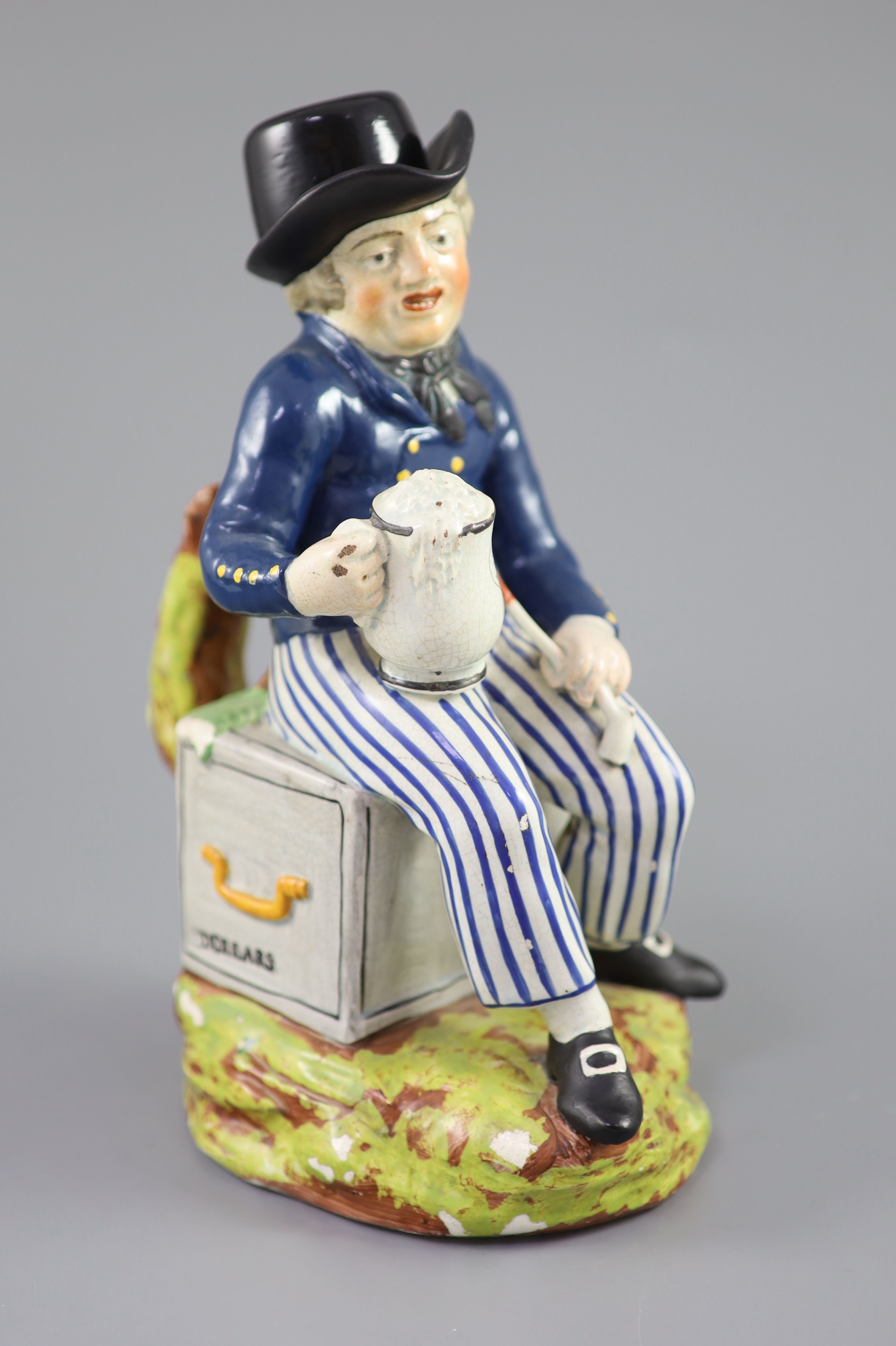 An American Pearlware sailor Toby jug with hat, Success to our Wooden Walls, c.1820, 27cm high